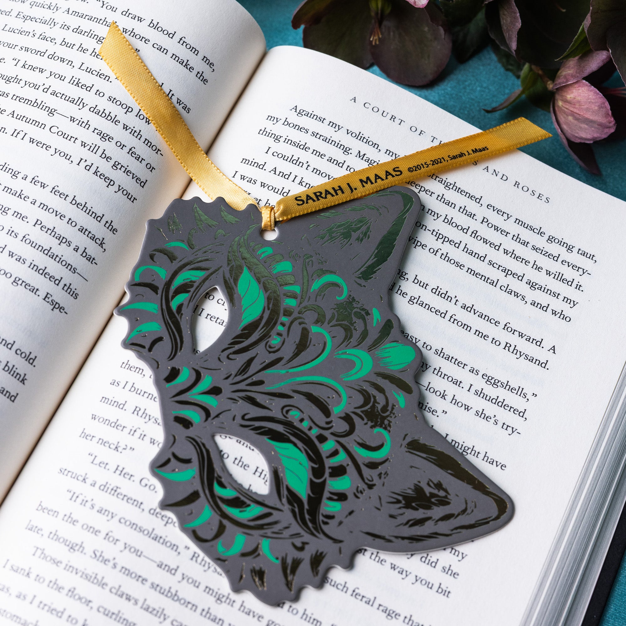 Green and gold wolf mask bookmark