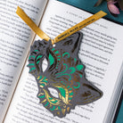 grey wolf mask bookmark with gold foil and green accents
