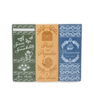 Three decorative book-themed cards or prints side by side featuring Jane Austen novels: 'Sense and Sensibility' in dark green, 'Pride and Prejudice' in tan, and 'Persuasion' in blue, each with ornate white and gold illustrations and text.