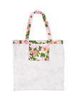 White tote bag with floral pattern on a white background