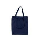 Navy blue tote bag with a pocket on a white background