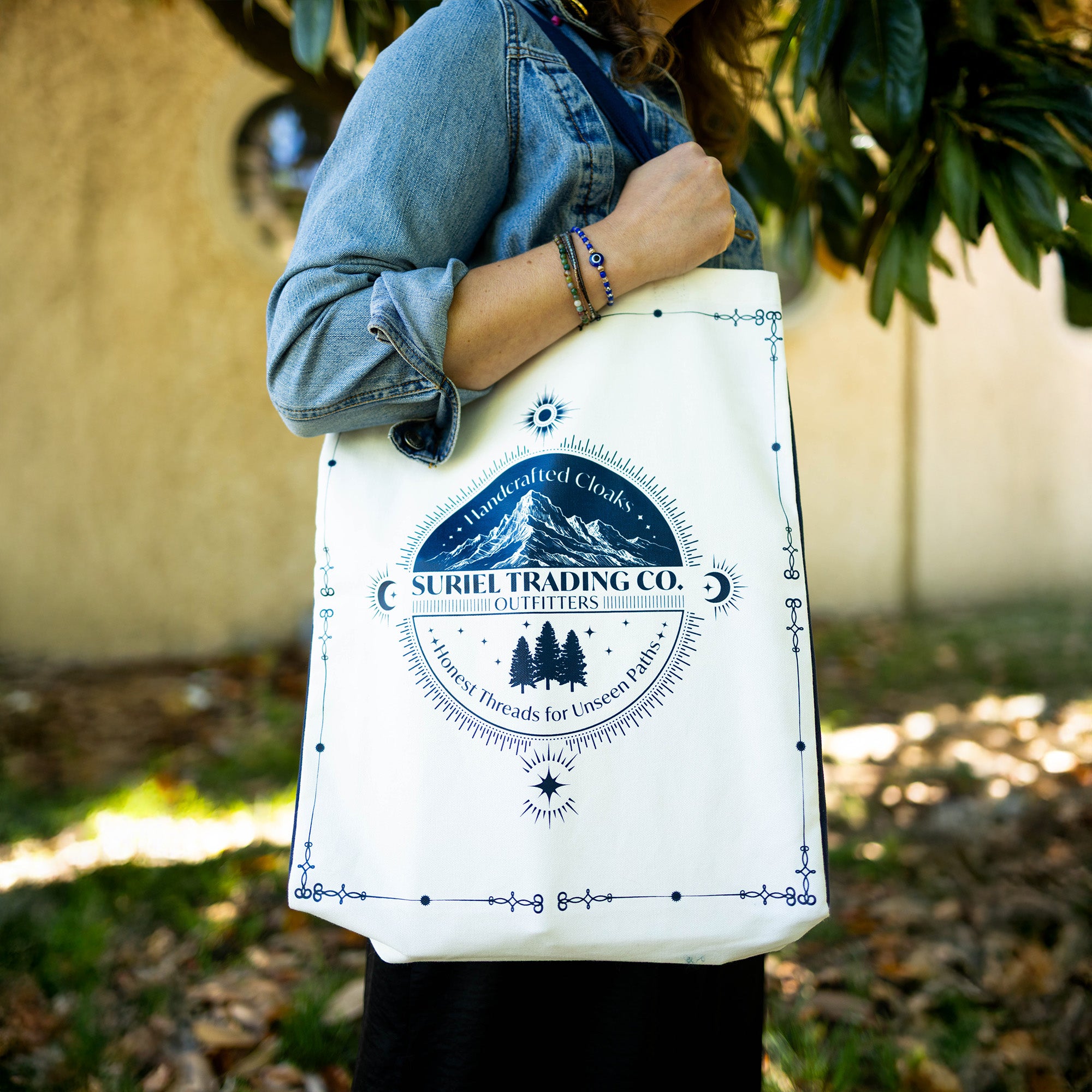 model carrying white suriel trading co tote bag