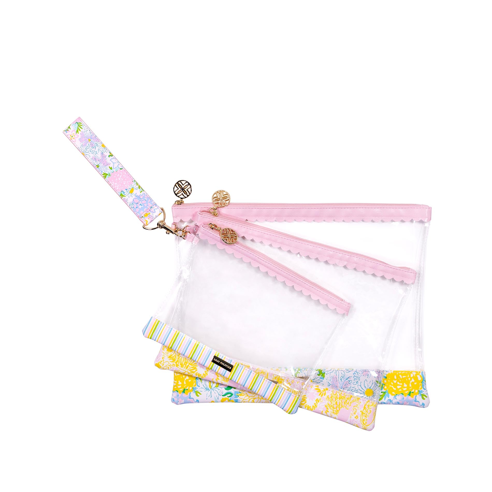Set of three colorful carryall bags with floral and striped patterns on a white background