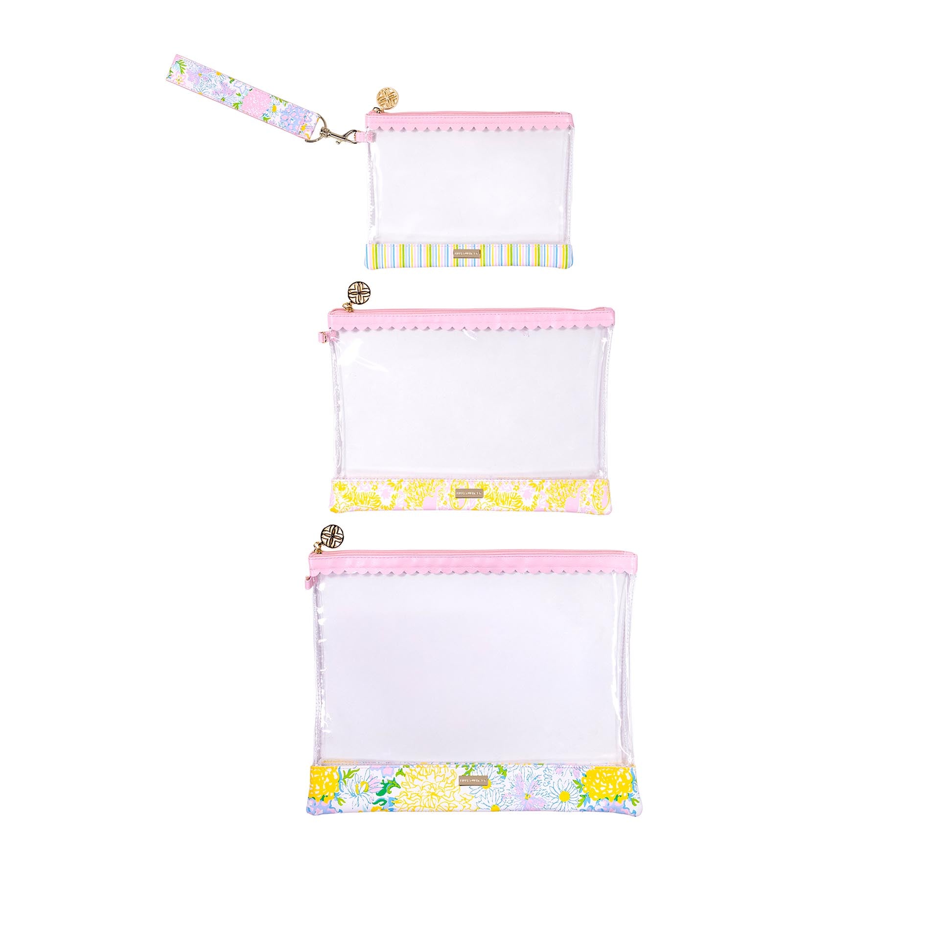 Set of three white pouches with colorful floral and striped patterns on a white background