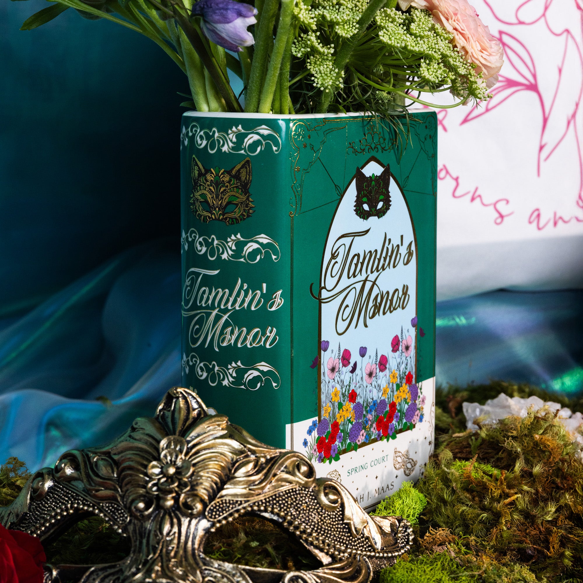 side view of Book-shaped vase with 'Tamlin's Manor' design