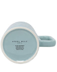 Light blue mug with 'Steel Mill' branding and washing instructions on a white background