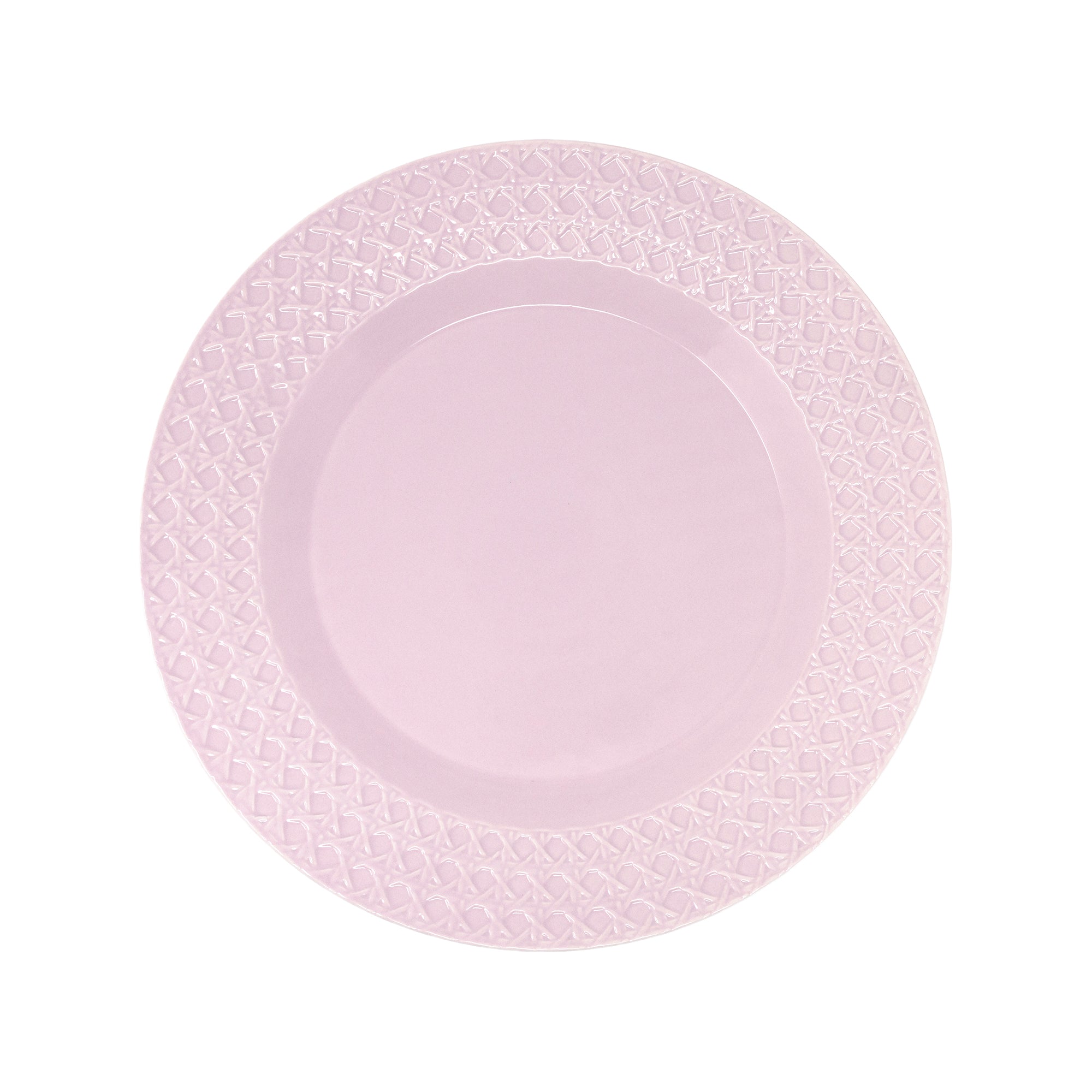 A light pink ceramic plate with a textured, embossed diamond pattern around the rim, shown from a top-down view on a white background.