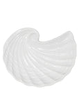 White shell-shaped plates on a white background