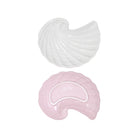 top and bottom view of two white shell-shaped plates on a white background