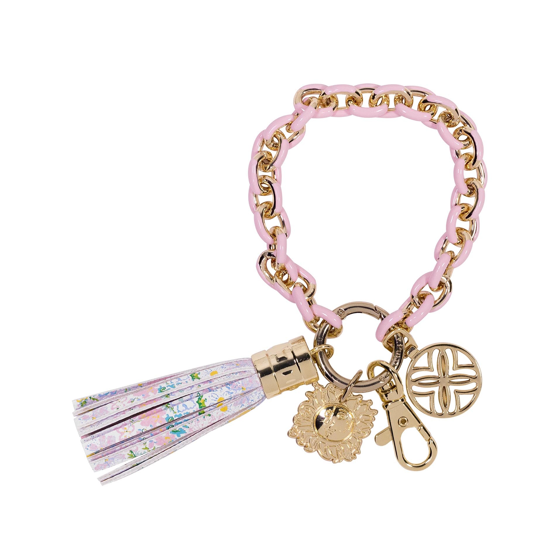 Pink and gold bracelet keychain with charms and a tassel on a white background