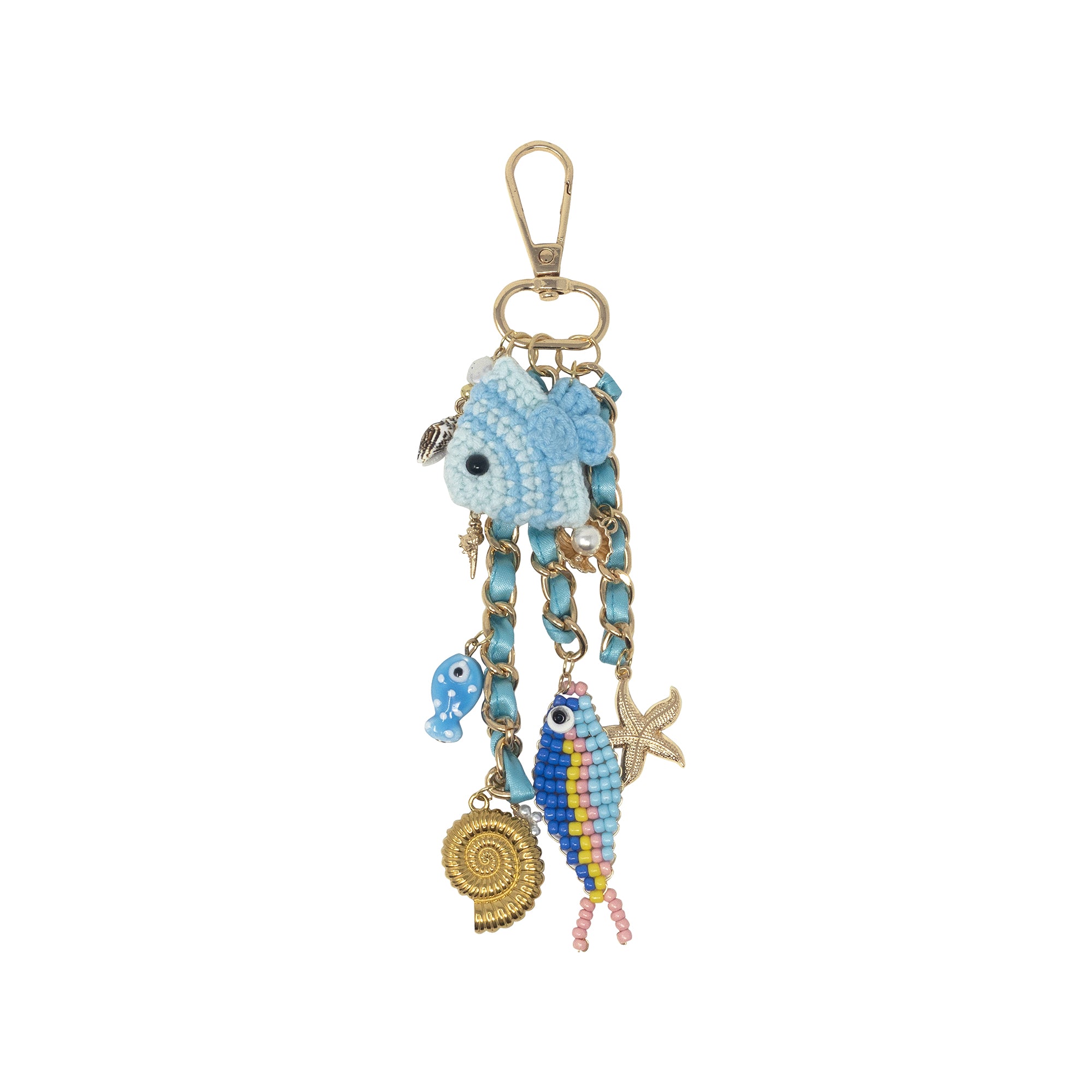 Decorative keychain with blue fish charm on a white background
