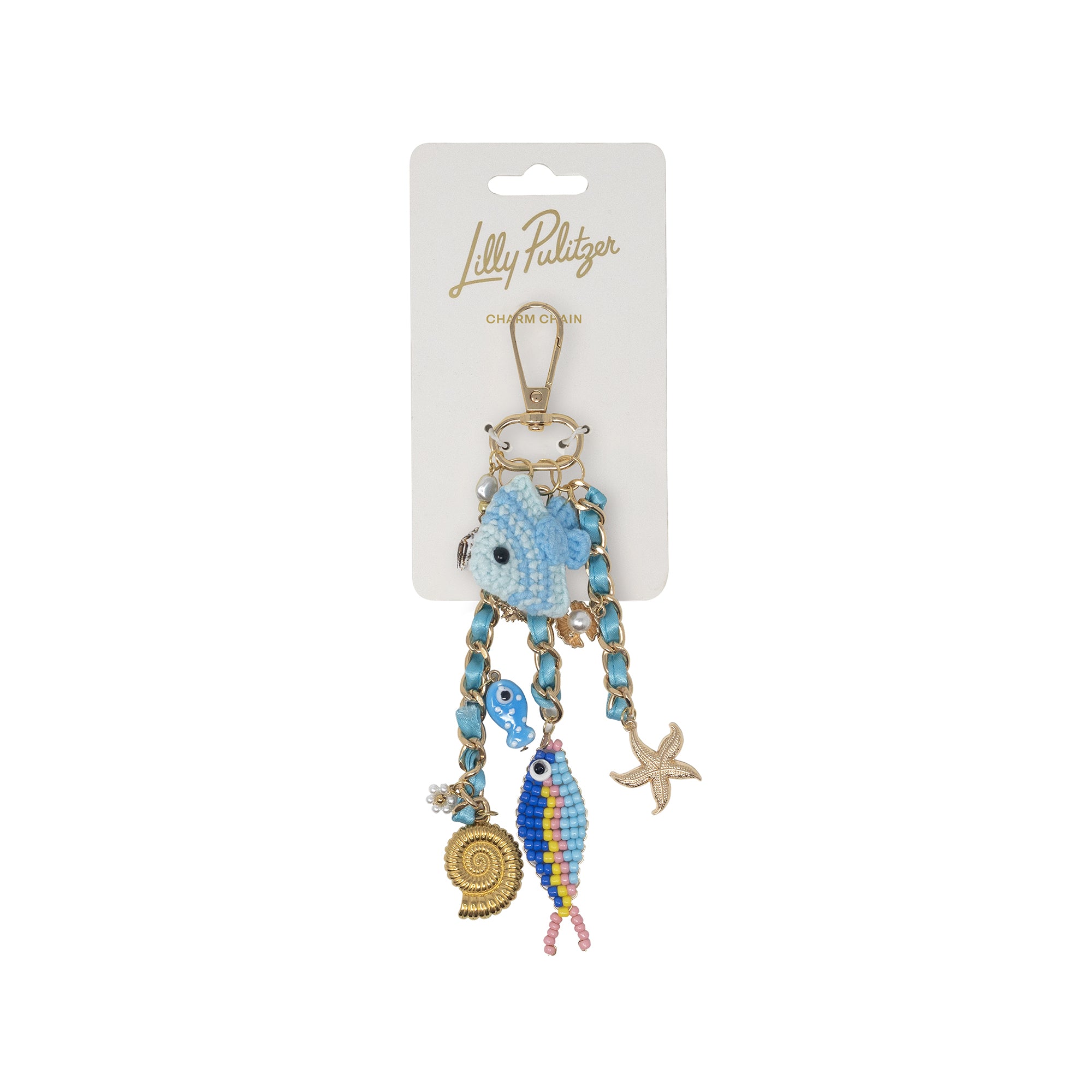 Decorative keychain with fish design on a white background