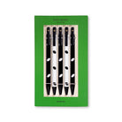 Set of black and white polka dot pens in a green box with 'kate spade' branding.
