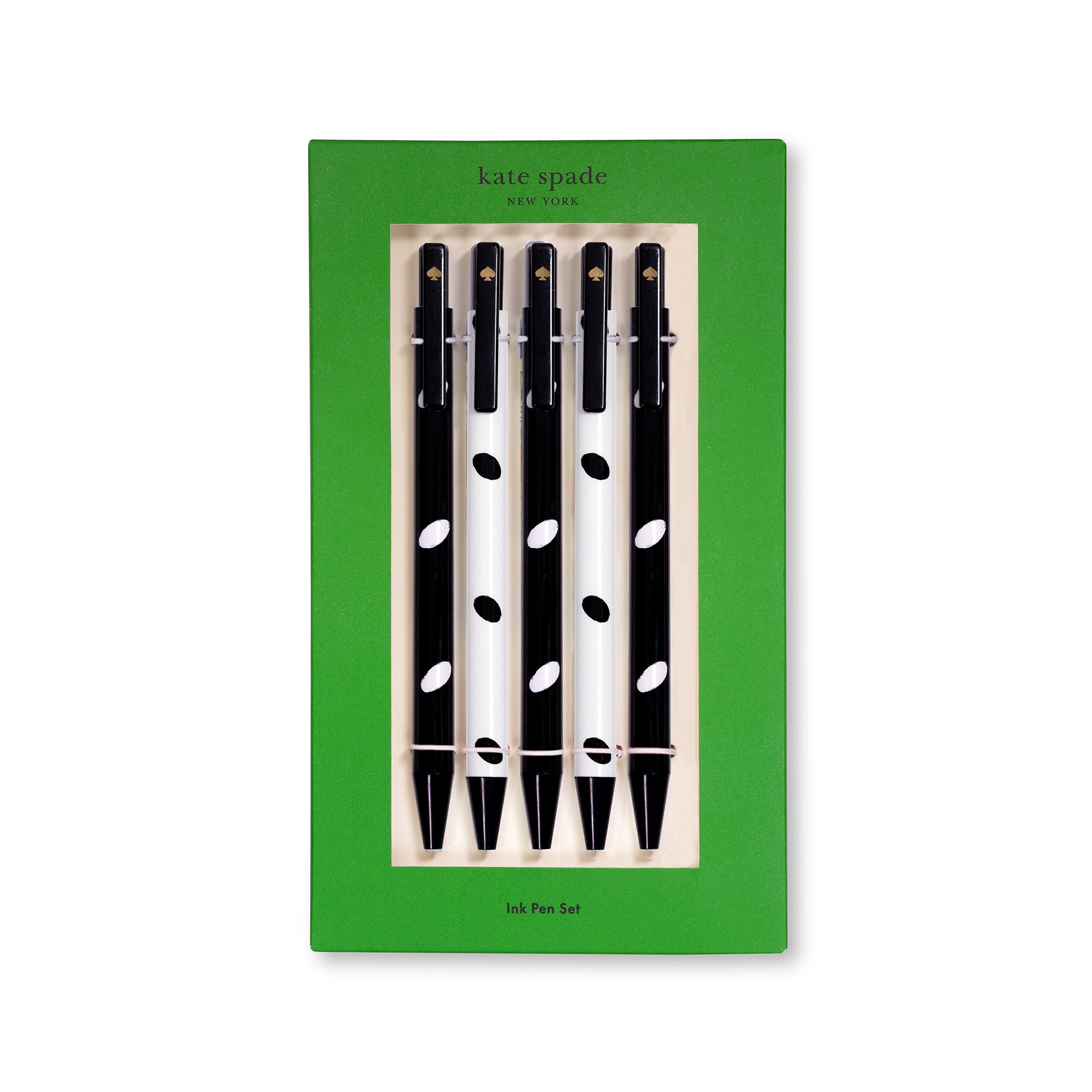 Set of black and white polka dot pens in a green box with 'kate spade' branding.