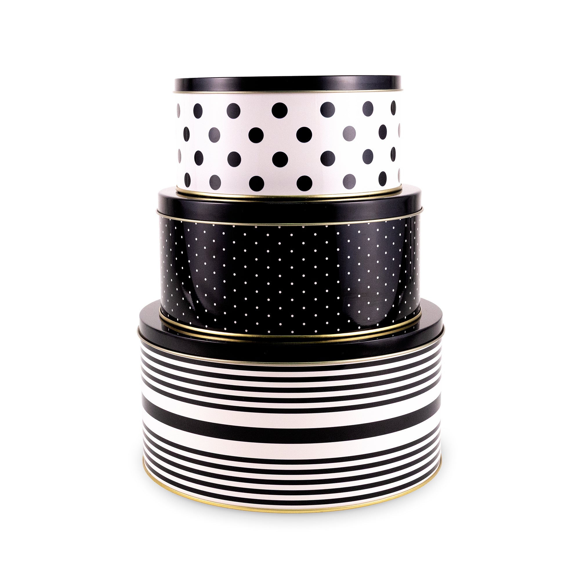 Three stacked round gift tins with black and white patterns, featuring polka dots and stripes, with thin gold trim, on a white background.