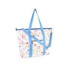 Floral-patterned tote bag with blue checkered straps on a white background