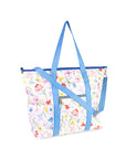 Floral-patterned tote bag with blue checkered straps on a white background