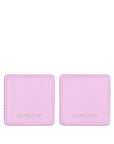 Back view of two pink floral corner bookmarks on a white background