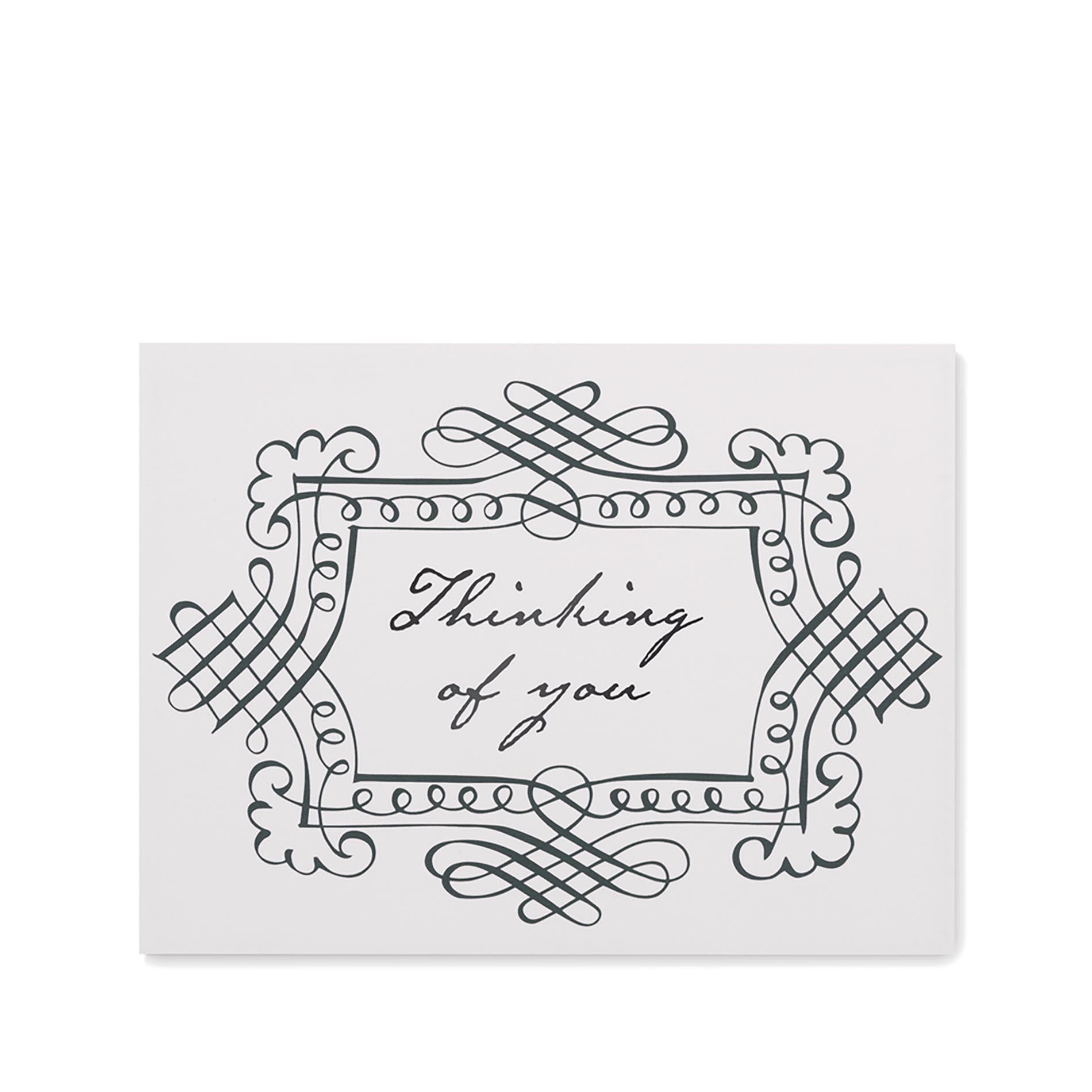 Card with 'Thinking of you' text and decorative frame on a white background