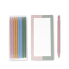 Set of colorful pens, a striped notepad, and a pink pen on a white background