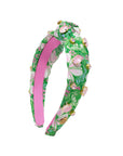 Floral headband with pink center on a white background