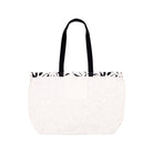 White tote bag with black handles on a white background