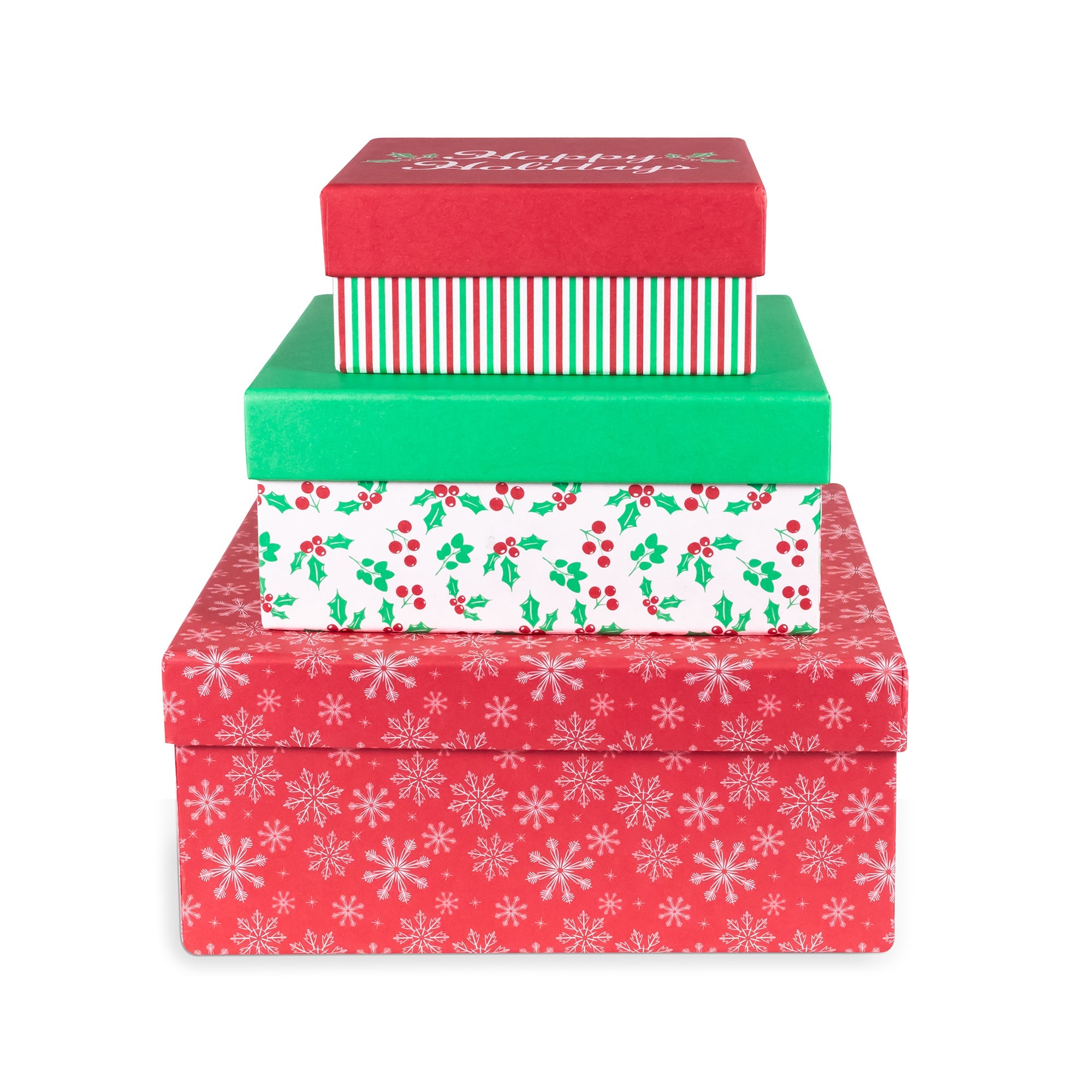 A stack of four nested Christmas-themed gift boxes on a plain white background. The boxes are red, green, and white, featuring different holiday patterns including snowflakes, holly and berries, and stripes, with 'Merry Christmas' written on the top box.