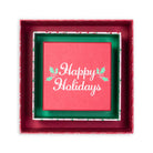 A square red gift box with a red interior, featuring a green inner liner and a red card in the center that reads 'Happy Holidays' in white script with small holly accents.