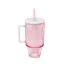 Pink tumbler with handle and straw on a white background