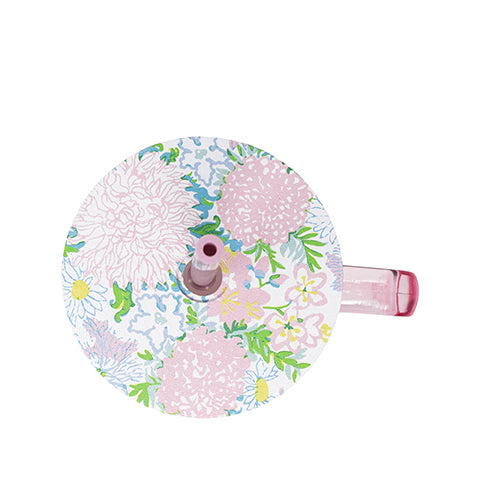 Floral-patterned water bottle with pink cap on a white background