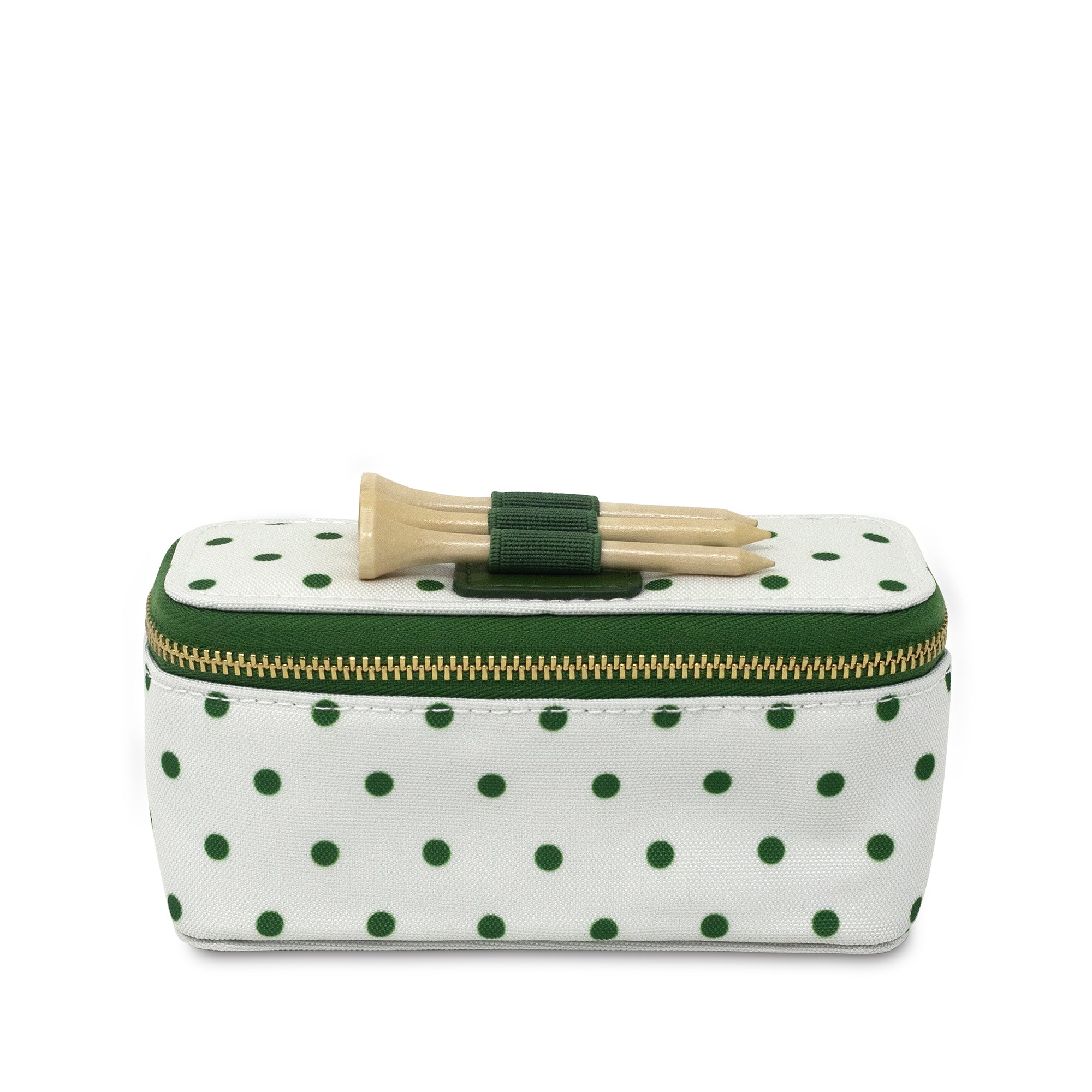 Polka dot makeup bag with hair clips on a white background