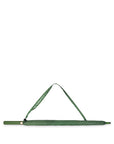 Green polka dot strap on a white background