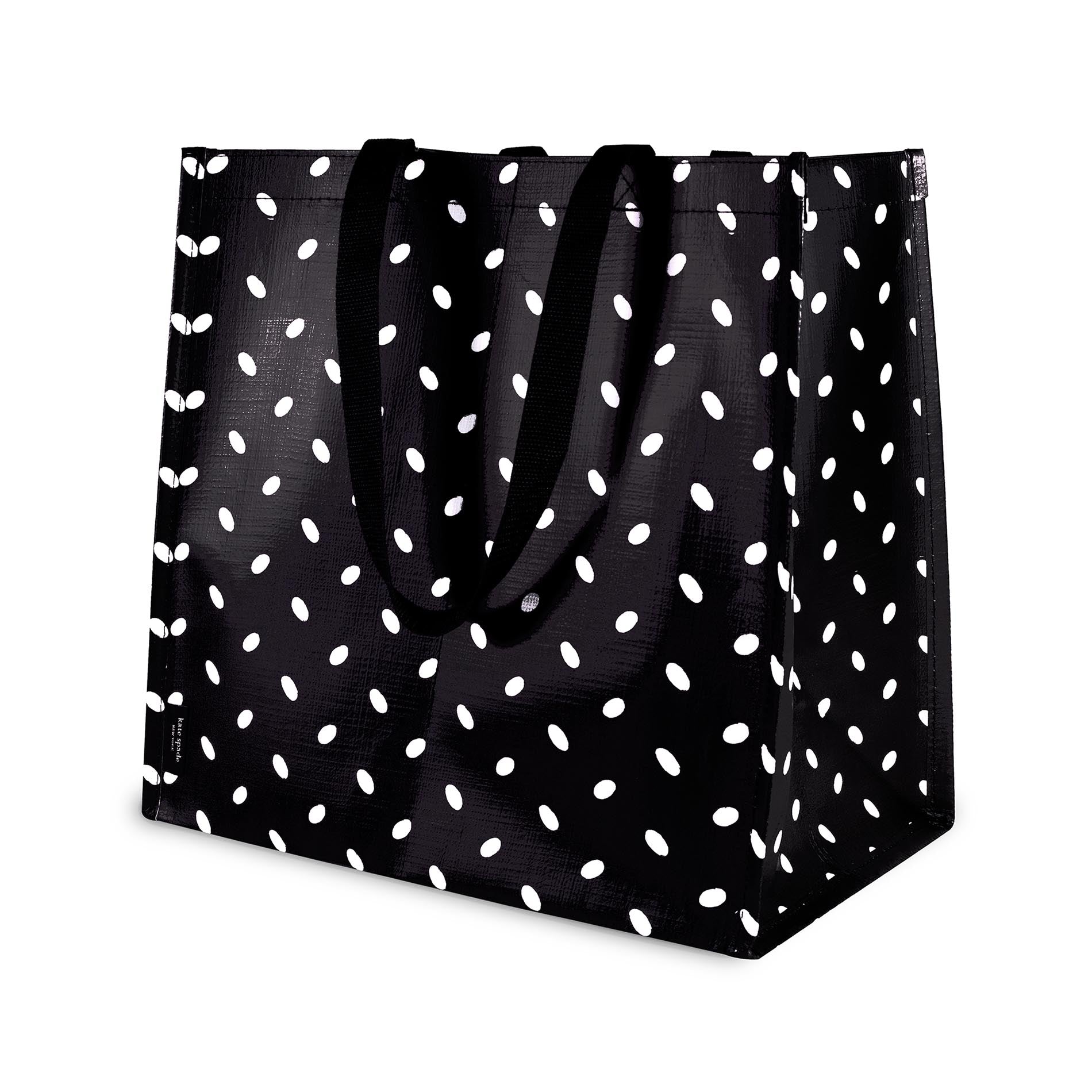Black tote bag with white polka dot pattern on a white background