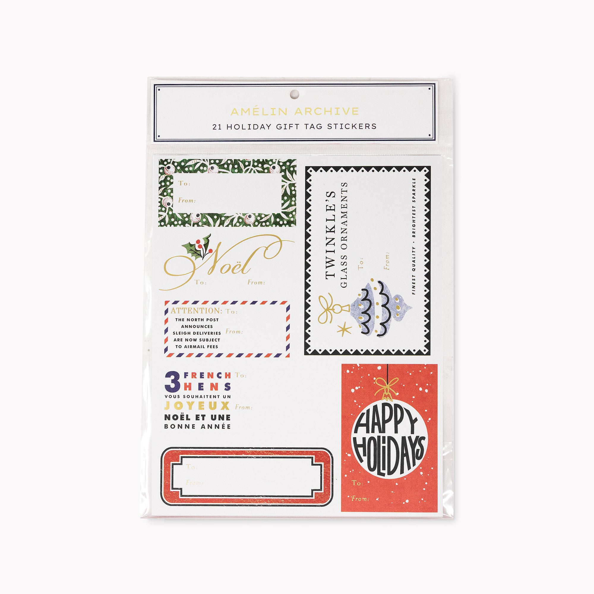 A sheet of Amélin Archive 21 Holiday Gift Tag Stickers in a clear plastic sleeve, featuring vintage-style Christmas designs in green, gold, red, and black on a white background.