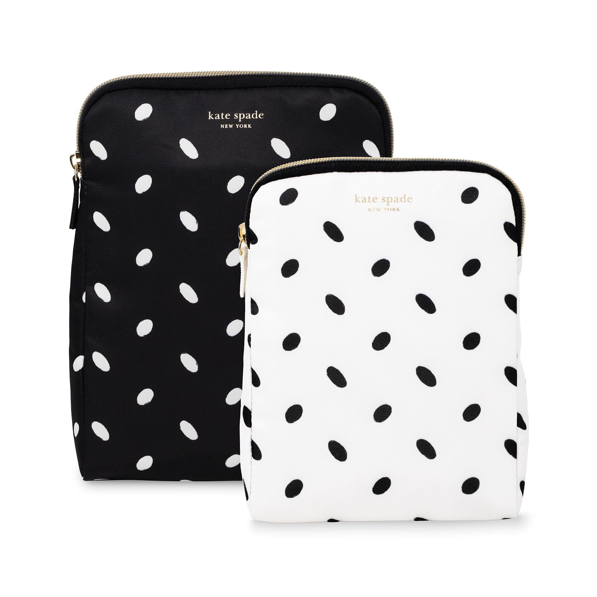 Two polka dot pouches from Kate Spade on a white background