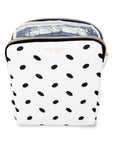 White pouch with black polka dots and 'kate spade' branding on a white background