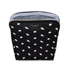 Black pouch with white polka dots featuring 'kate spade new york' branding on a white background.