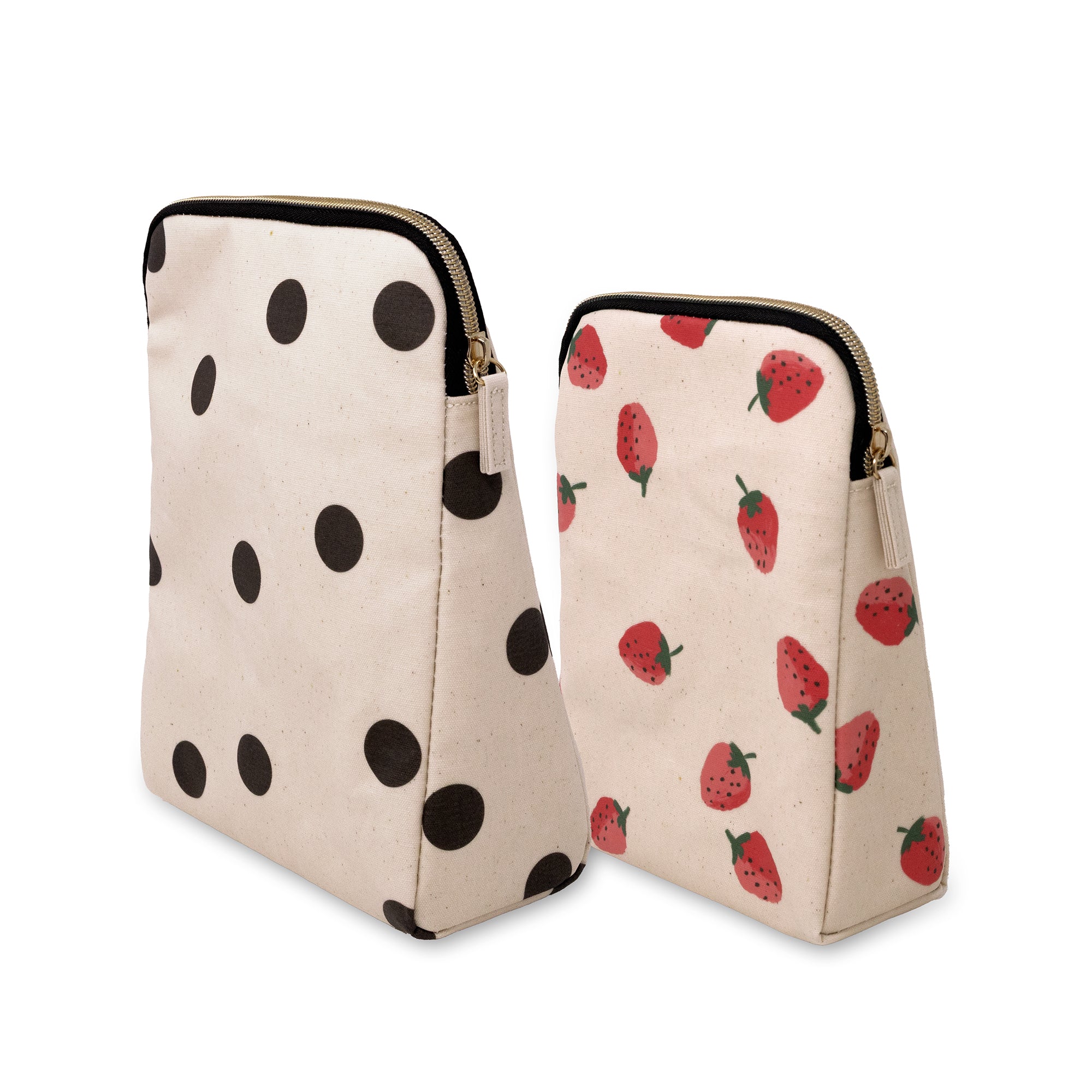 Two canvas zippered pouches on a white background. The larger pouch on the left has black polka dots on a cream background, and the smaller pouch on the right has a red strawberry print on a cream background.