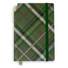 A hardcover notebook with a green plaid pattern cover, featuring a dark green elastic closure band and a gold pen tucked into the side.