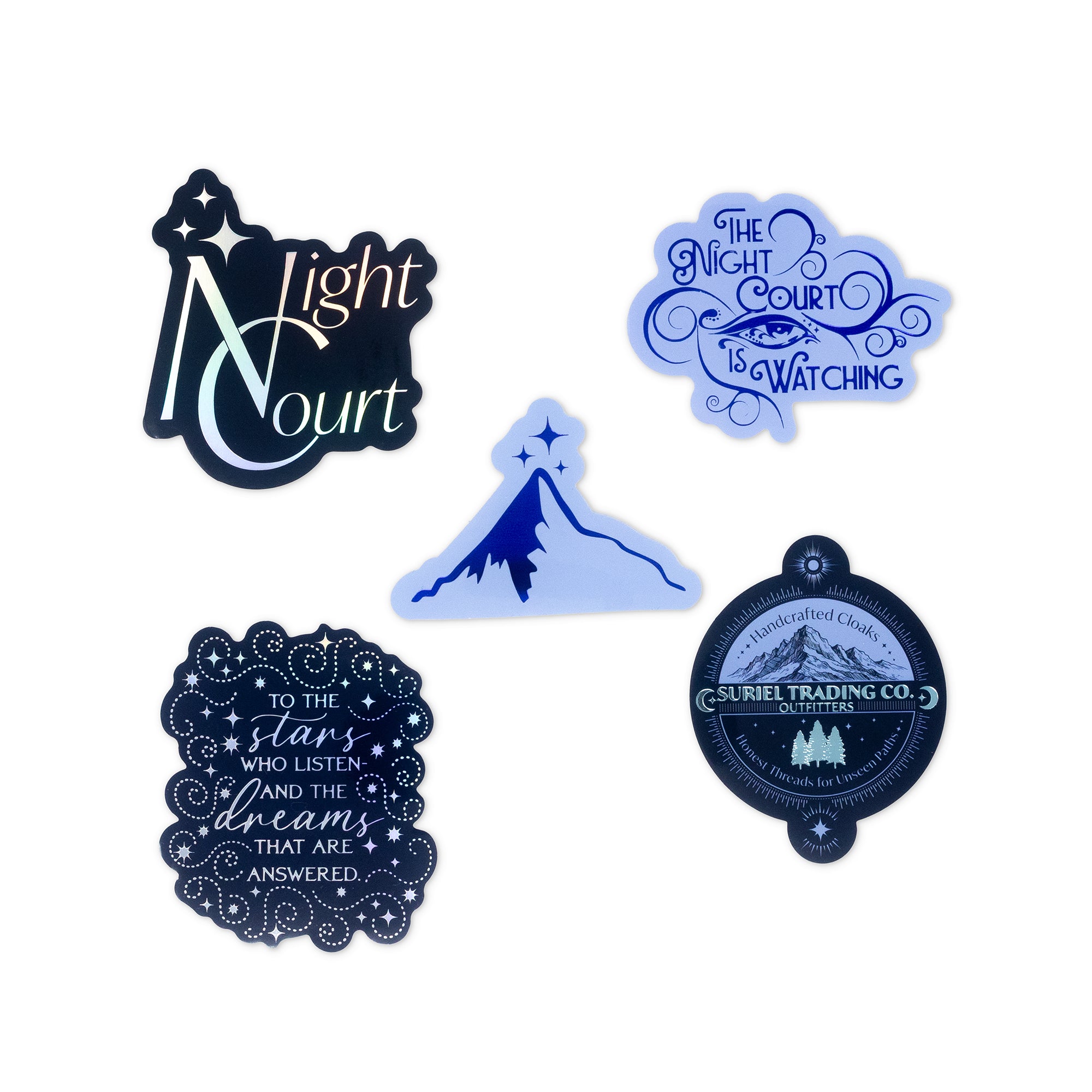 Set of five decorative stickers with various designs and text on a white background