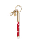 Red and gold pen-shaped keychain on a white background