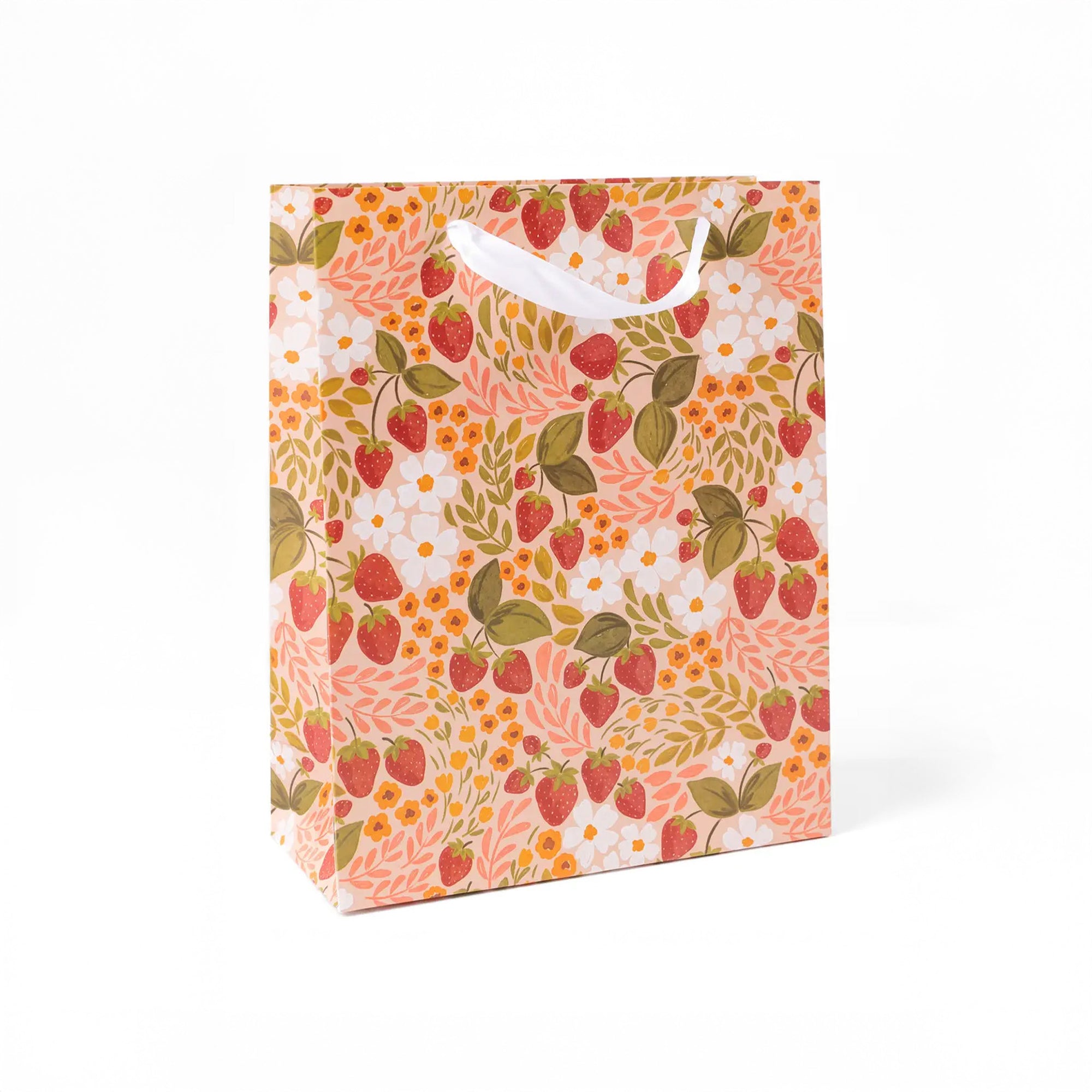 Pink large gift bag with white handle and all over strawberry and white flower print