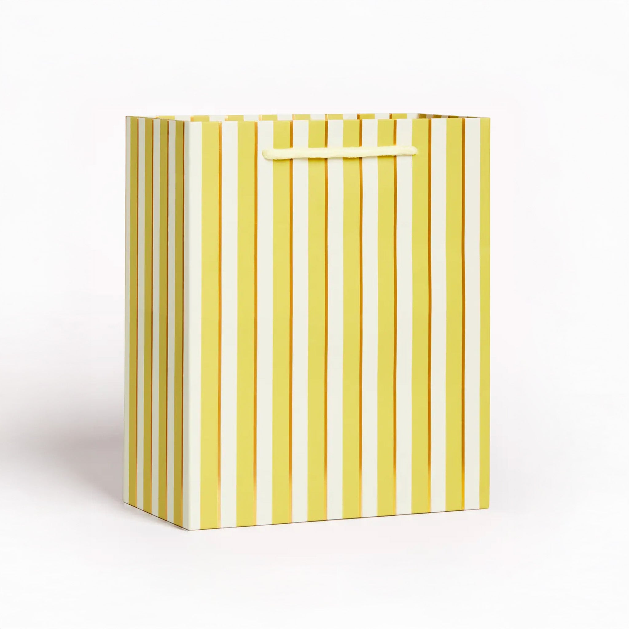 Large yellow and white vertical stripe gift bag with yellow handle