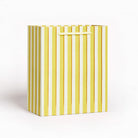 Large yellow and white vertical stripe gift bag with yellow handle