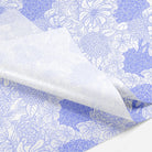 Up close of white and lavender floral tissue paper