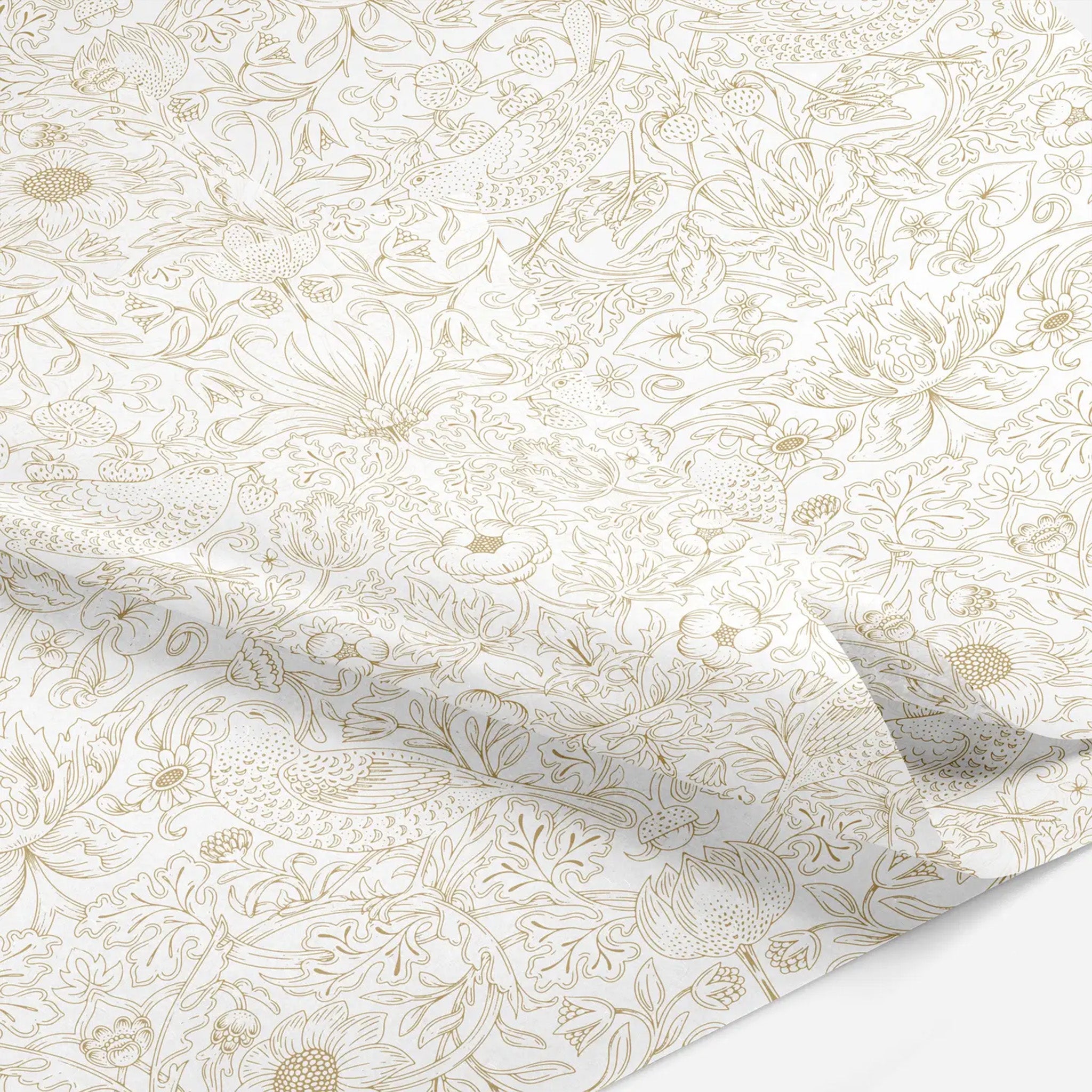 Up close of decorative tissue paper with gold floral pattern