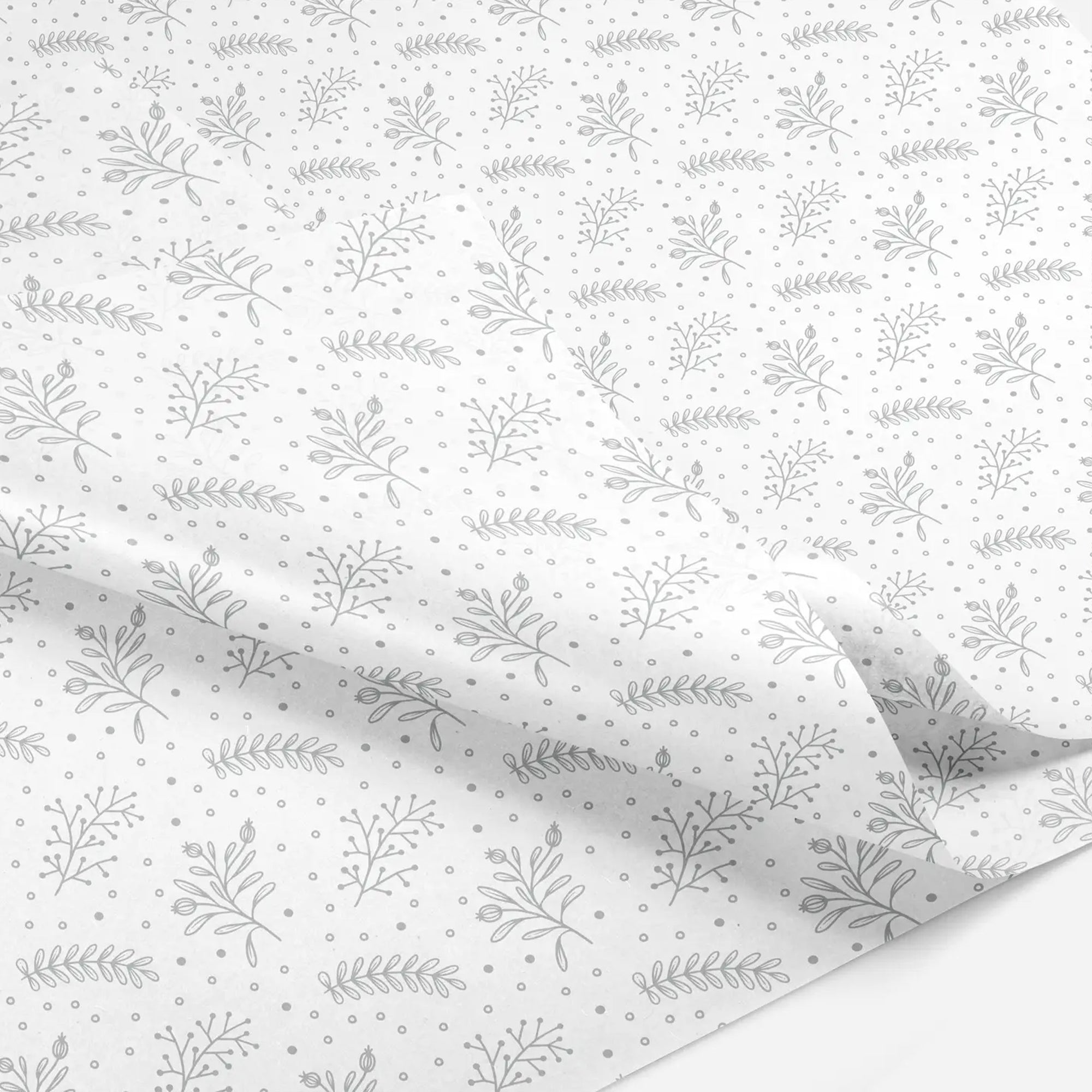 Up close of silver floral patterned tissue paper