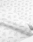 Up close of silver floral patterned tissue paper