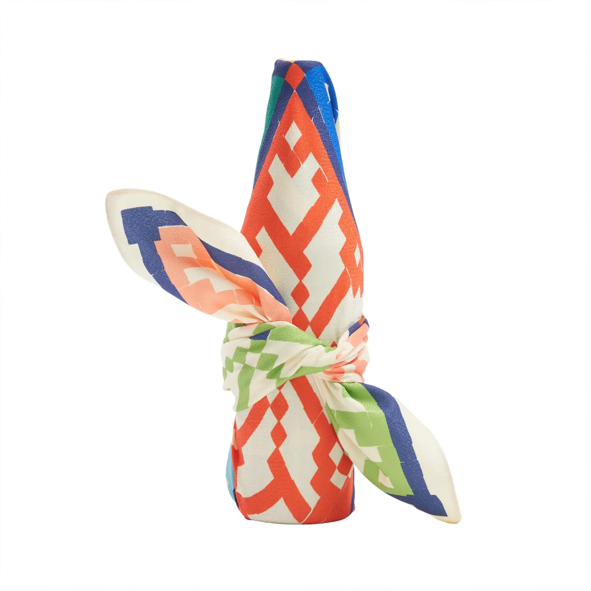 Colorful geometric patterned reusable gift wrap on a white background