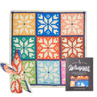 Colorful patterned gift wrap with a decorative bow and packaging on a white background